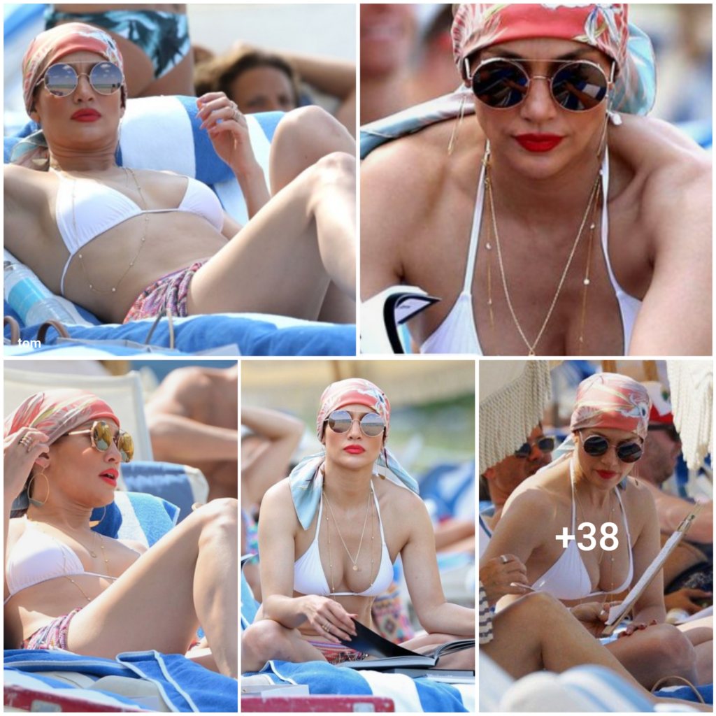 “JLo Bares Her Toned Physique in a Stunning White Swimsuit at Miami Beach”